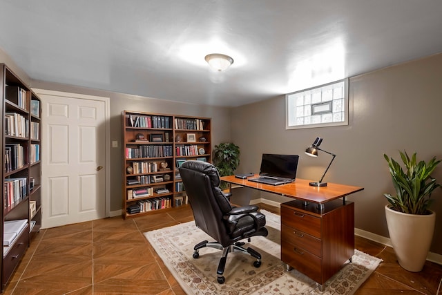 office area featuring parquet floors