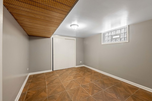 basement with parquet floors