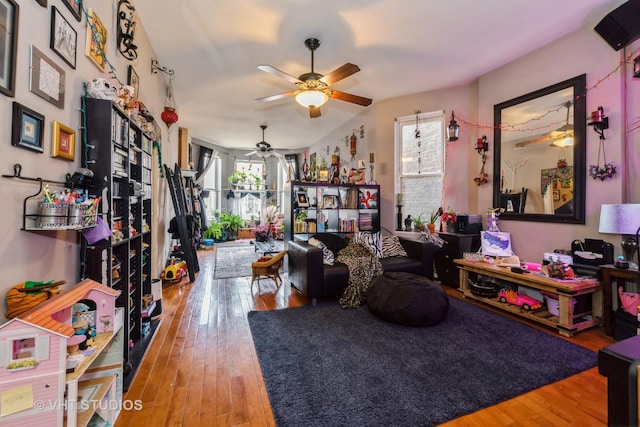 interior space featuring hardwood / wood-style flooring and ceiling fan