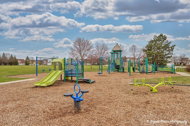 communal playground with a lawn