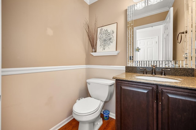 3444 Owens Ln, Dekalb, IL 60115 - half bathroom with vanity, wood finished floors, and ornamental molding