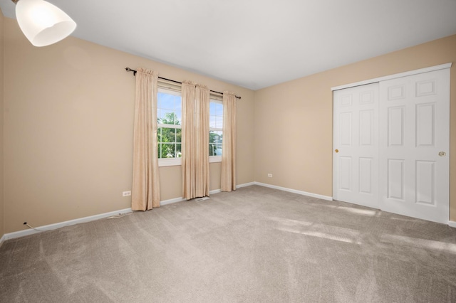 3444 Owens Ln, Dekalb, IL 60115 - unfurnished bedroom with carpet flooring and a closet