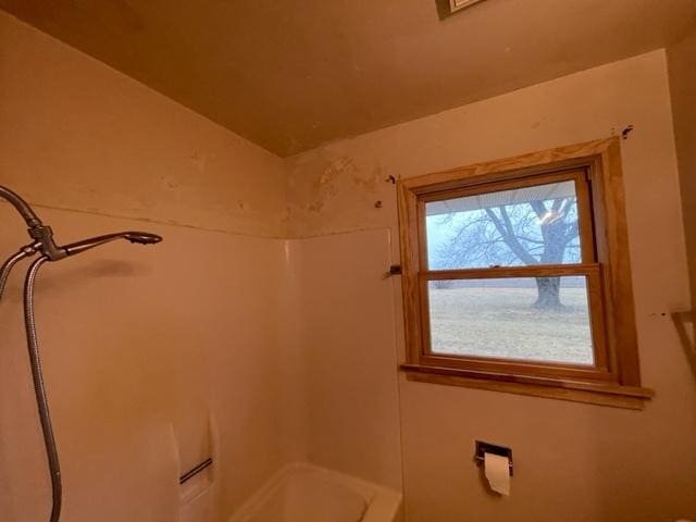 full bathroom with a bath and walk in shower