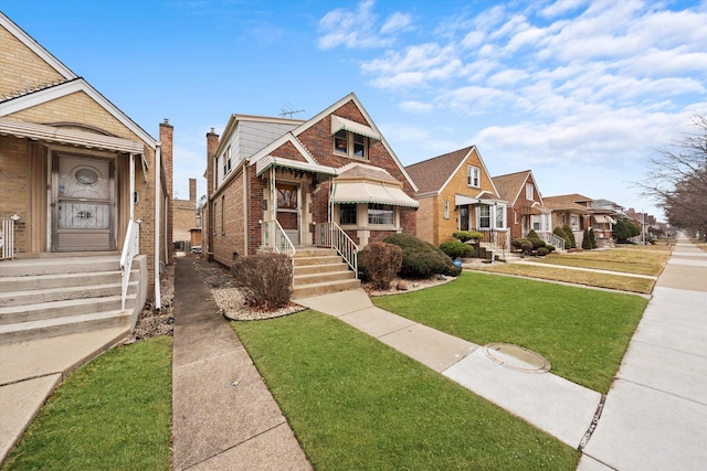 view of front of home featuring a front lawn