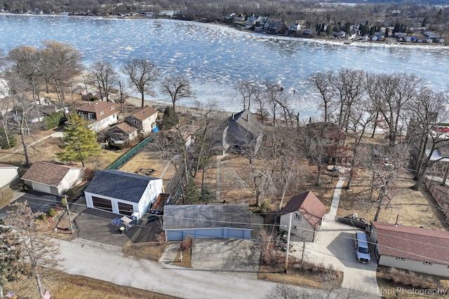 drone / aerial view with a water view