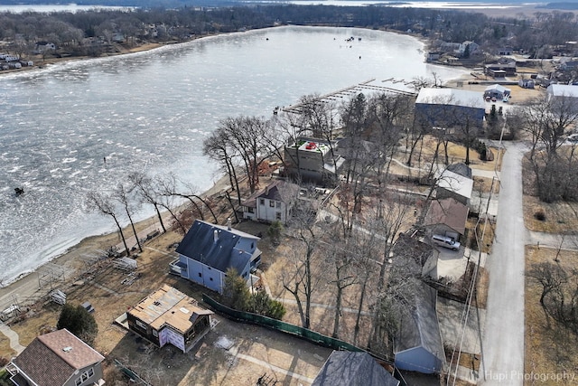 drone / aerial view with a water view