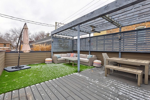 wooden terrace featuring a yard, a pergola, and outdoor lounge area