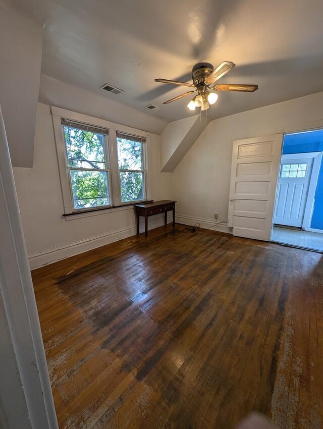 bonus room featuring dark wood-type flooring and ceiling fan