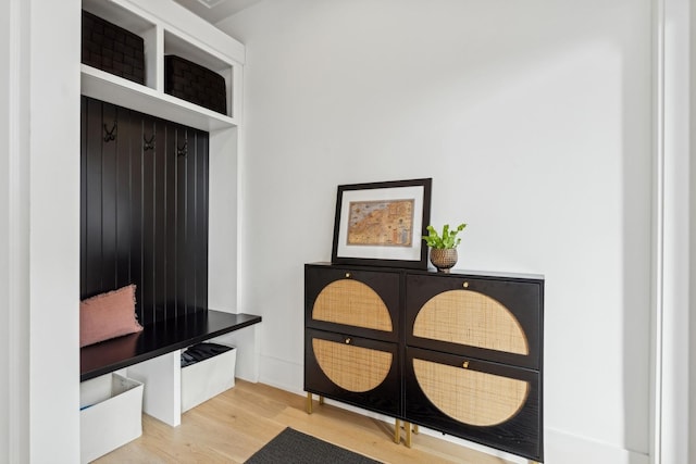 mudroom with wood finished floors