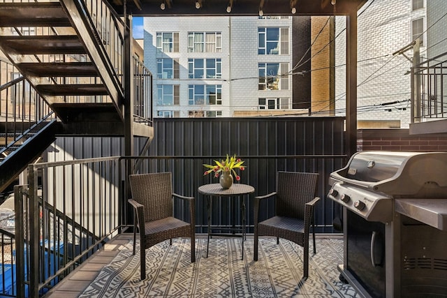 balcony featuring area for grilling