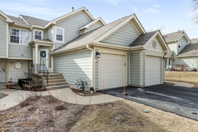 view of front of property featuring a garage