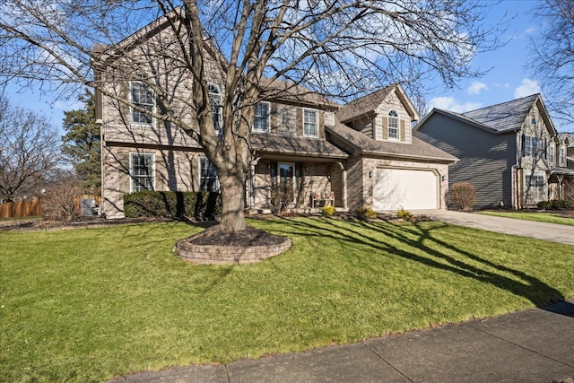 view of front of property with concrete driveway, an attached garage, fence, a front yard, and brick siding