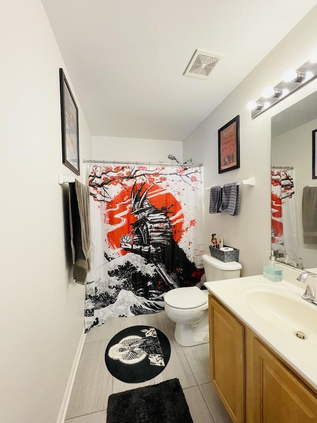 bathroom featuring walk in shower, vanity, and toilet