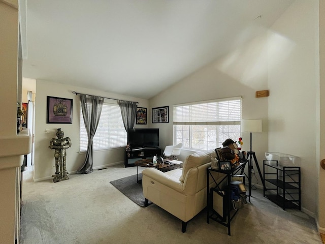 living room featuring lofted ceiling and light carpet