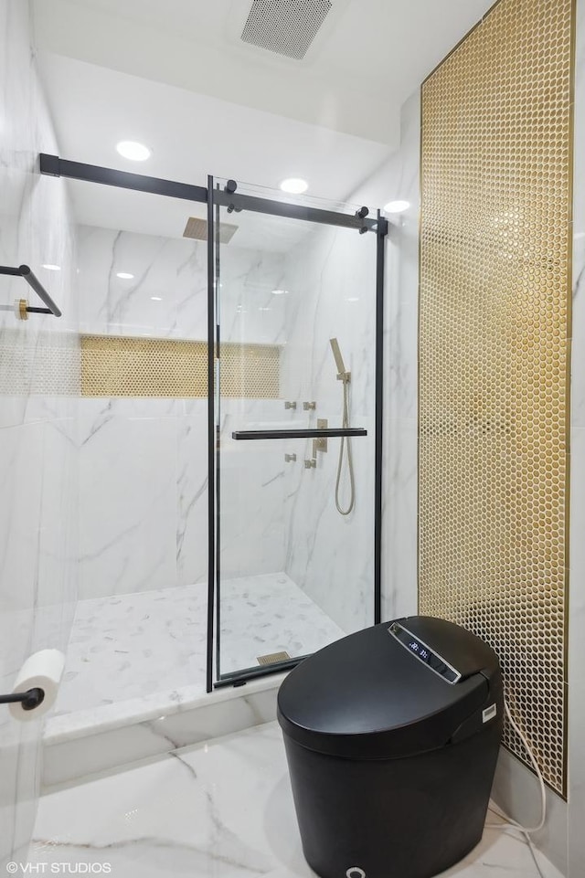 full bathroom with marble finish floor, visible vents, and a marble finish shower