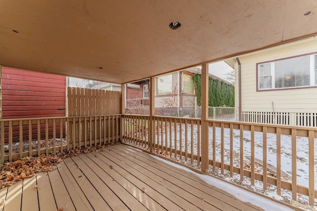 view of snow covered deck