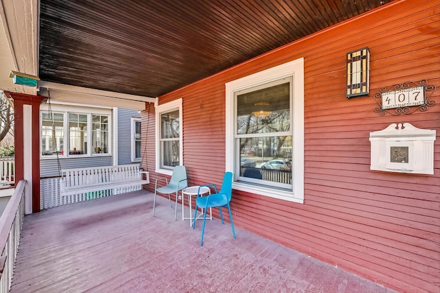 wooden deck featuring a porch