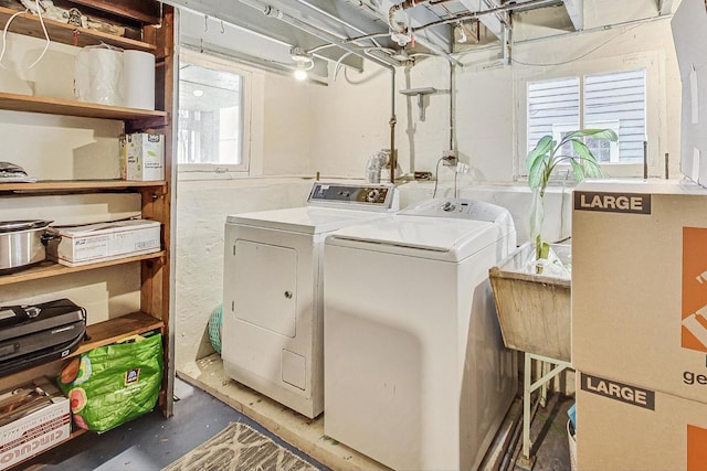 laundry area featuring laundry area and washer and clothes dryer