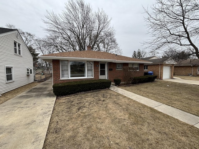 view of front of house with a garage and a front yard