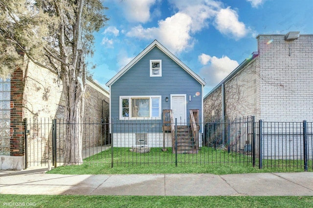 view of front of house featuring a fenced front yard and a front yard