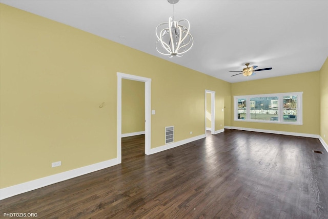 unfurnished living room featuring dark wood-style floors, baseboards, and visible vents