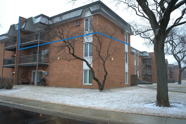 view of snow covered property