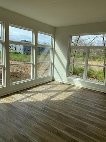 unfurnished sunroom with a healthy amount of sunlight