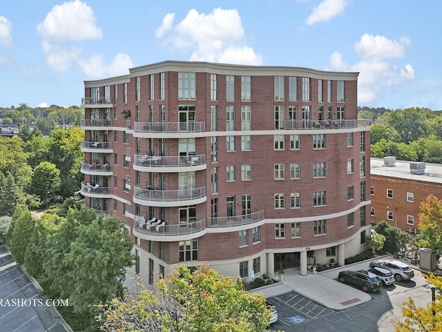 view of property featuring central AC unit