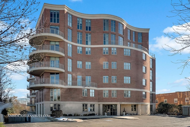 view of building exterior with central air condition unit