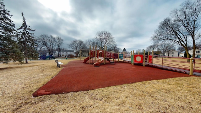 view of playground featuring a lawn