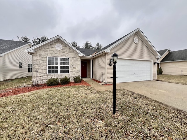 single story home with a garage and a front yard