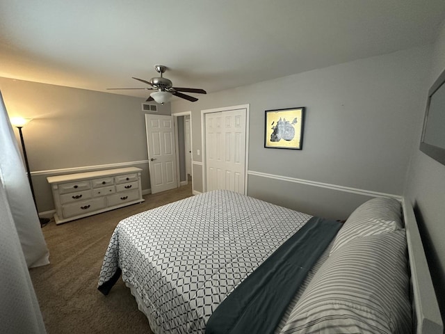 carpeted bedroom with a closet and ceiling fan