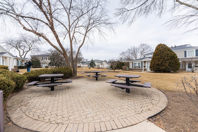 surrounding community with a patio