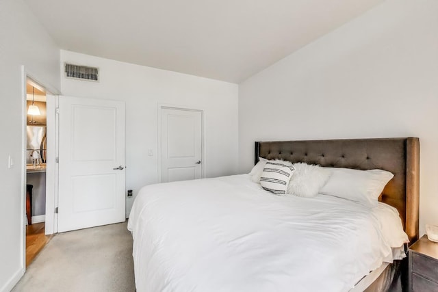 bedroom featuring visible vents