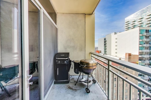 balcony featuring a view of city and area for grilling