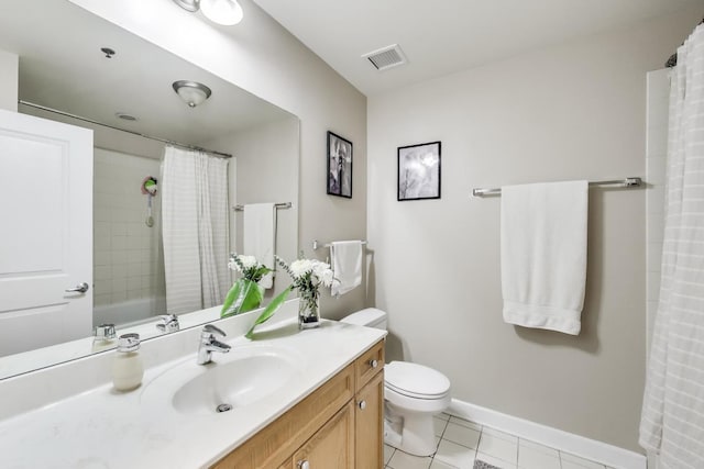 bathroom featuring baseboards, visible vents, a shower with shower curtain, toilet, and tile patterned flooring