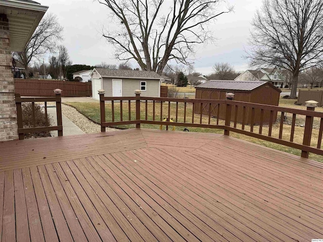 wooden deck with a shed