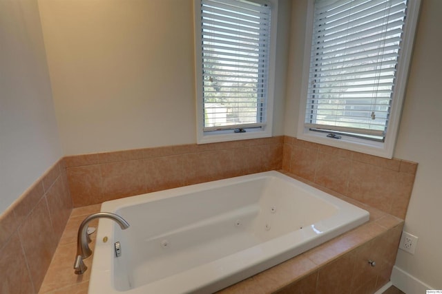 bathroom with a whirlpool tub