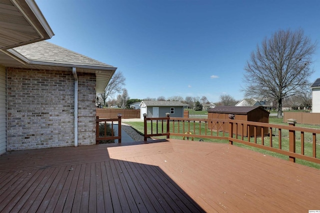 1501 Gayla Dr, Quincy, IL 62305 - wooden deck featuring a storage unit and a fenced backyard
