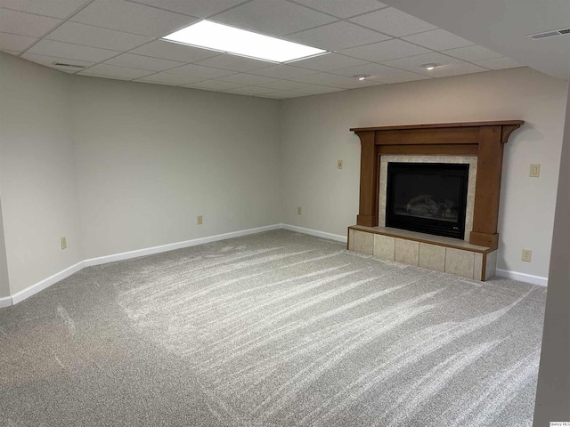 1501 Gayla Dr, Quincy, IL 62305 - unfurnished living room with carpet flooring, a tile fireplace, and a drop ceiling