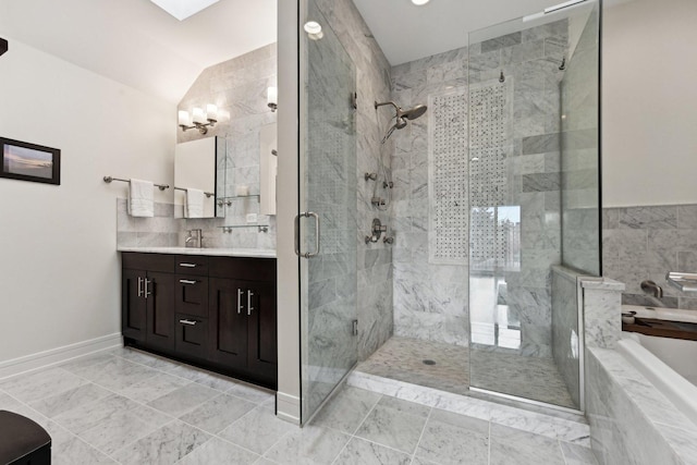 bathroom with vaulted ceiling, vanity, and separate shower and tub