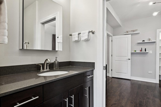 bathroom with vanity and hardwood / wood-style floors