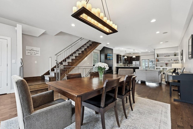 dining area featuring dark hardwood / wood-style flooring