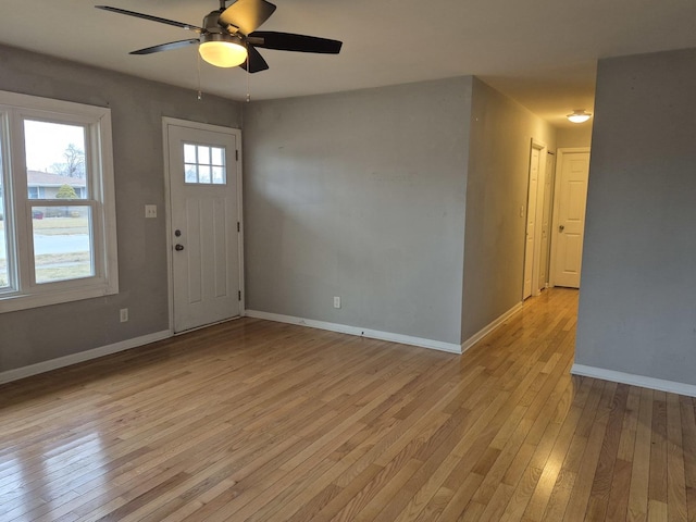 entrance foyer featuring ceiling fan and light hardwood / wood-style flooring