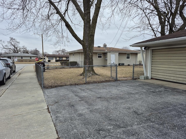 view of side of property featuring a garage