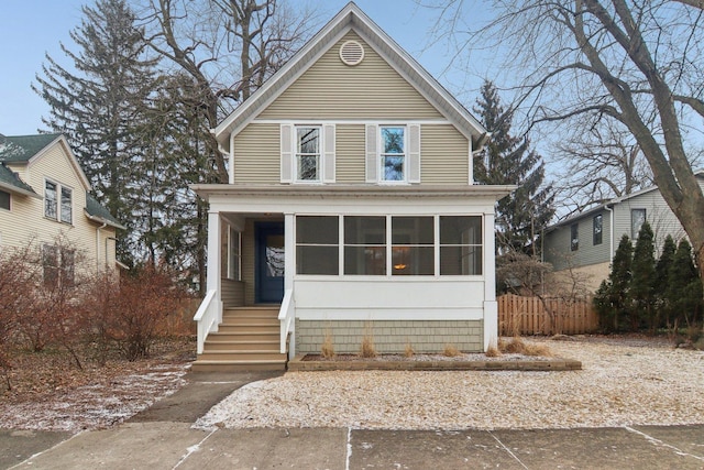 view of property with a sunroom