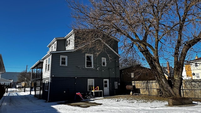 view of snow covered property