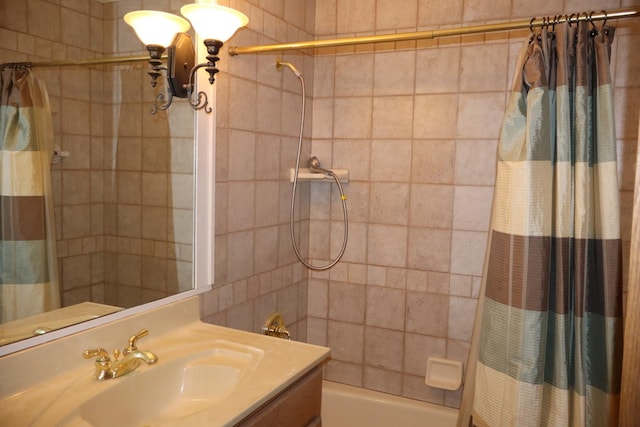 bathroom with shower / tub combo and vanity