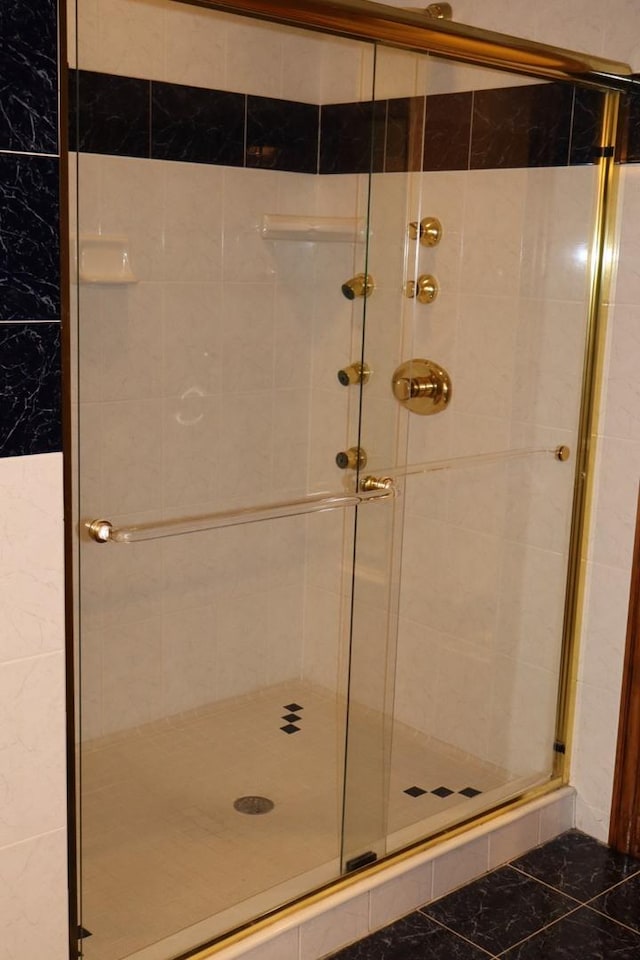 bathroom with an enclosed shower