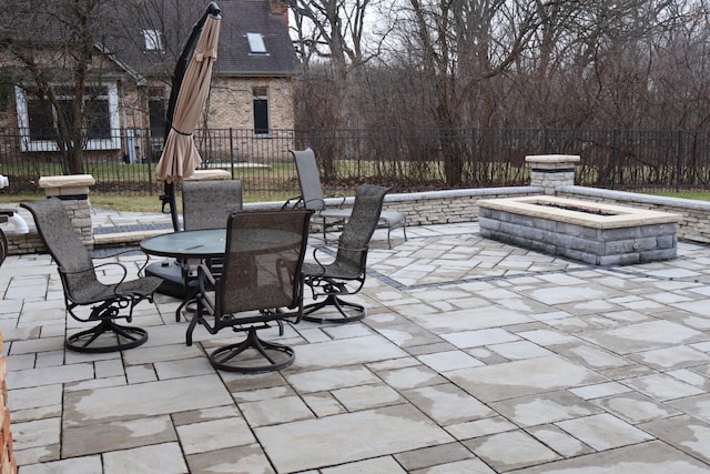 view of patio featuring a fire pit